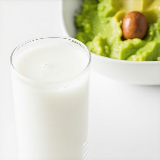 Soft food options for dental recovery A bowl of smooth yogurt and avocado for post-implant nutrition.